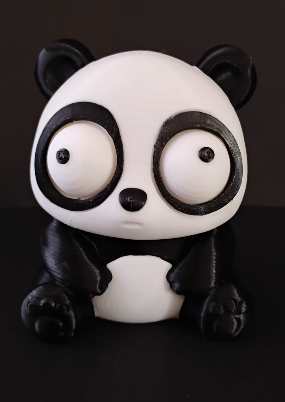 Panda de olhos móveis
