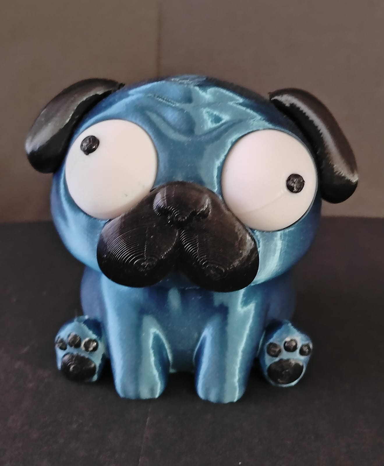 Cachorro de olhos móveis