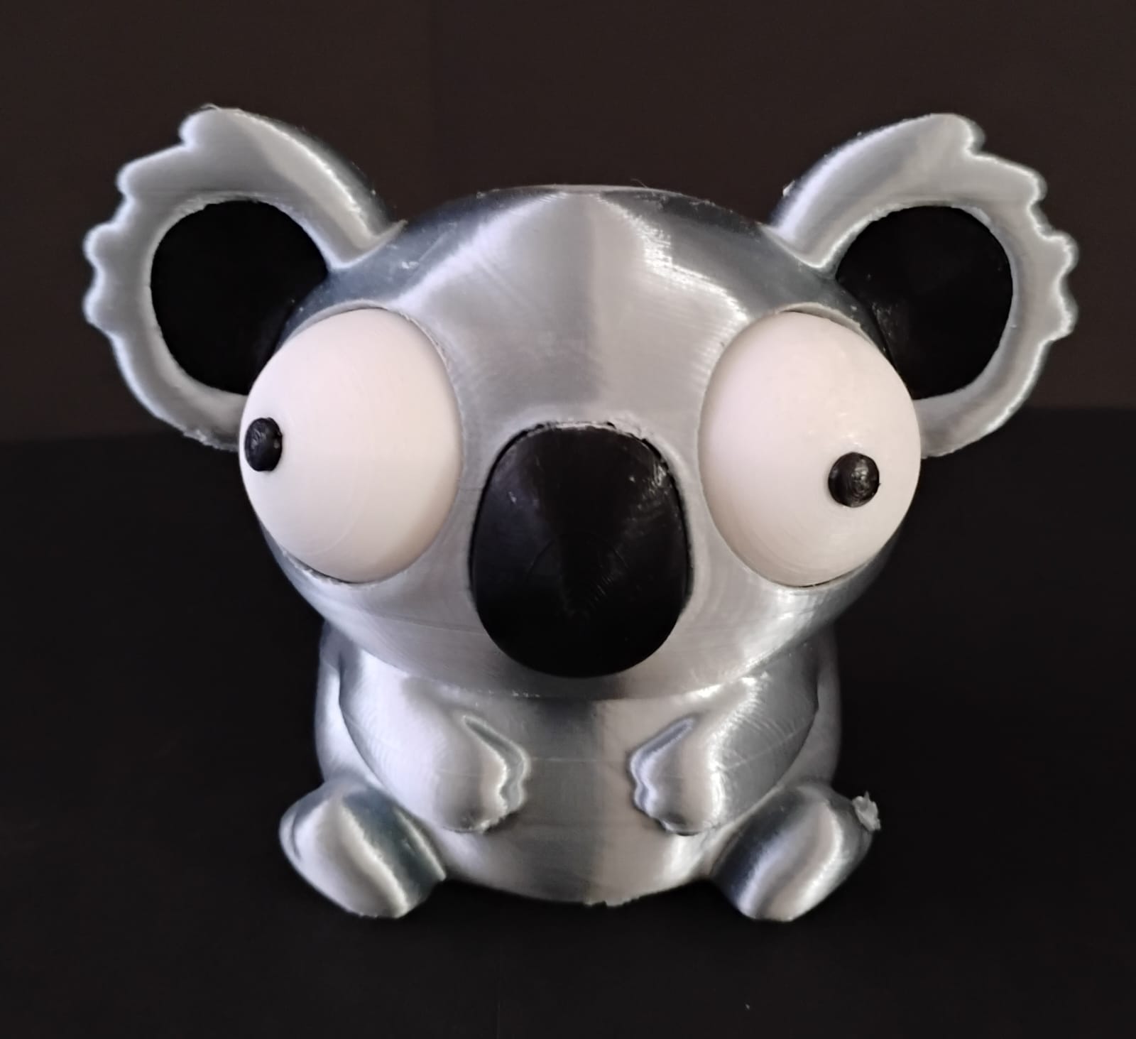 Coala de olhos móveis